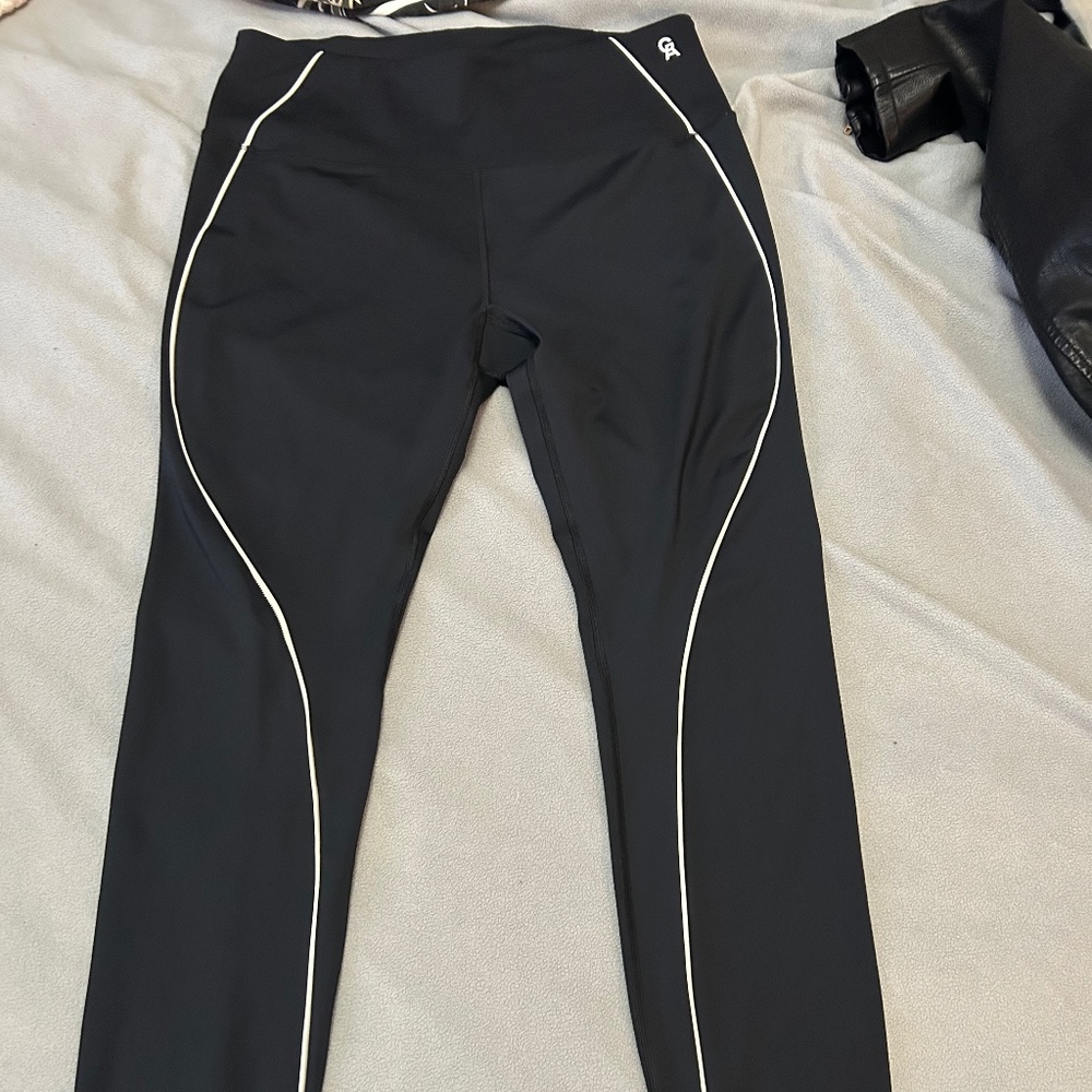 Good American Black leggings with white piping detail
